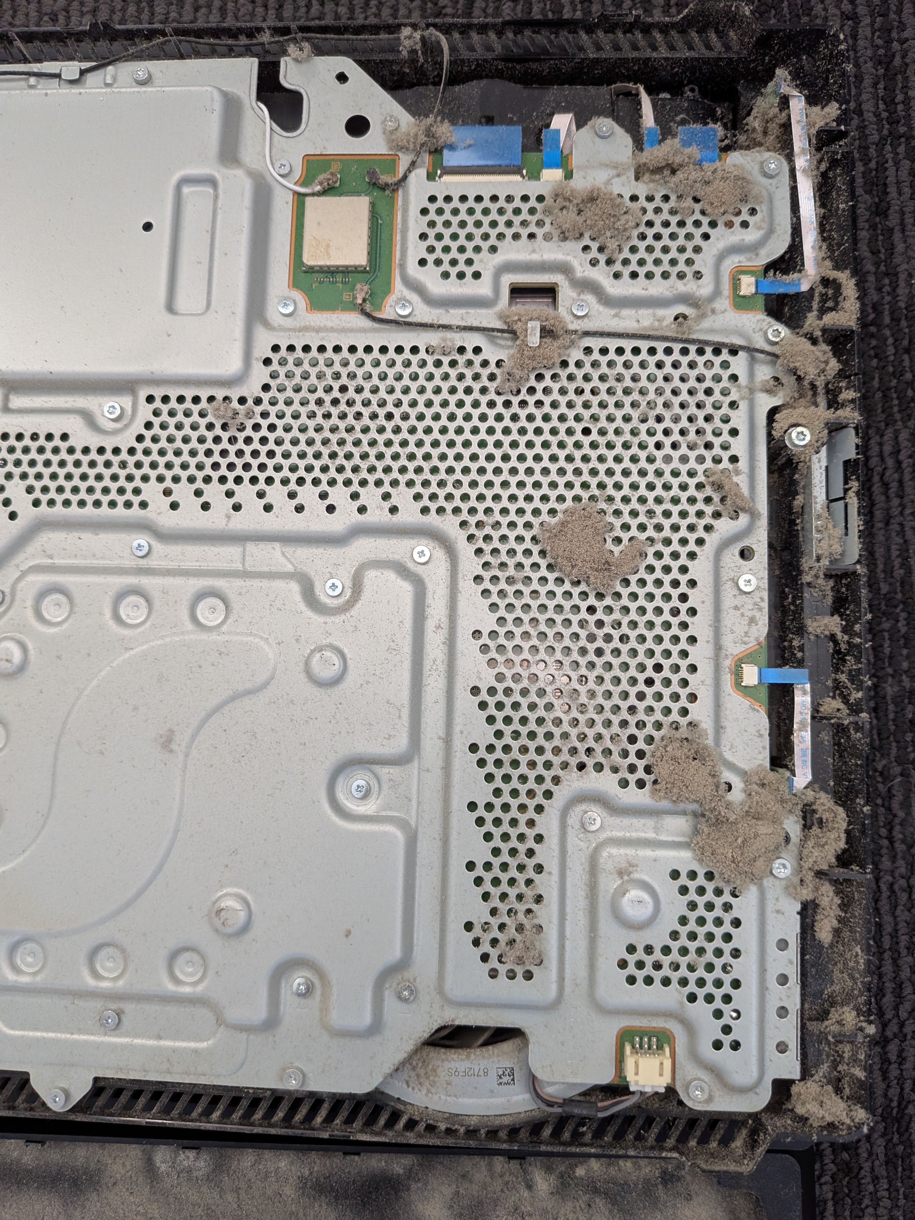 Internal dust on a PS4 internal housing causing overheating