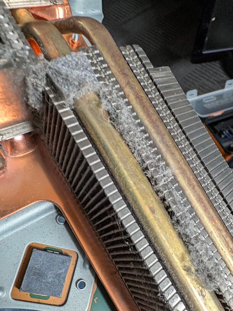 PS5 Shutting down in Market Weighton | Saved Game Service Plan 4 PS5 heatsink with fluff stopping airflow