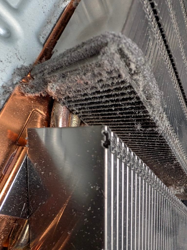 PS5 Shutting down in Market Weighton | Saved Game Service Plan 5 Playstation 5 heatsink with fluff and dirt